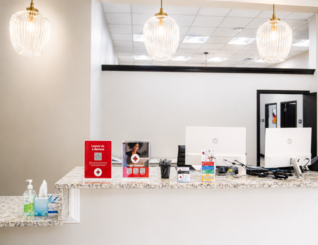 Front desk reception area at VitalCare Express clinic with check-in counter and patient service setup